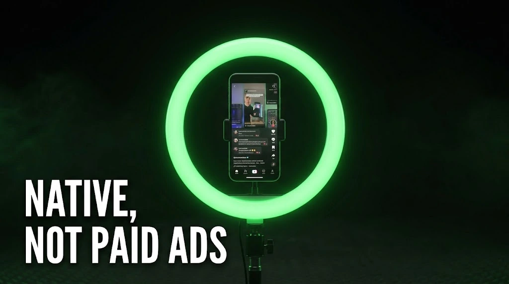A phone inside a green ring light showing a short-form feed, illustrating native creator posts where paid gambling ads are blocked.